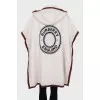 White cape with brand logo