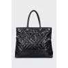 Quilted leather bag with brand logo