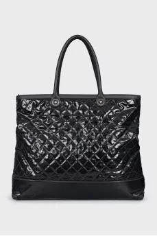 Quilted leather bag with brand logo