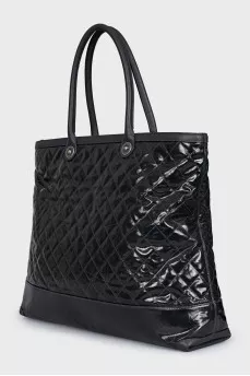 Quilted leather bag with brand logo