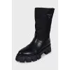 Black boots with silver logo