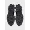 Black boots with silver logo