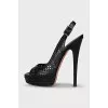 Black leather sandals with perforations