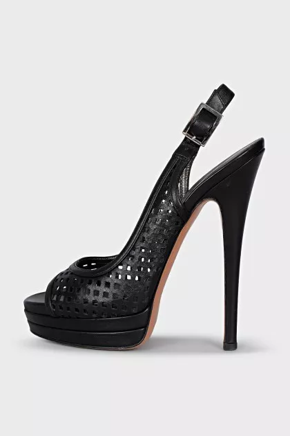 Black leather sandals with perforations