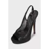 Black leather sandals with perforations