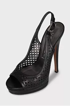 Black leather sandals with perforations