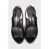 Black leather sandals with perforations