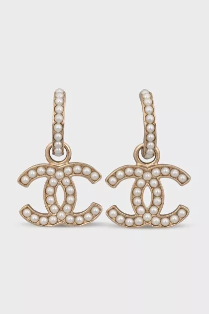 Gold earrings decorated with beads