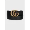 Leather belt with gold-colored buckle