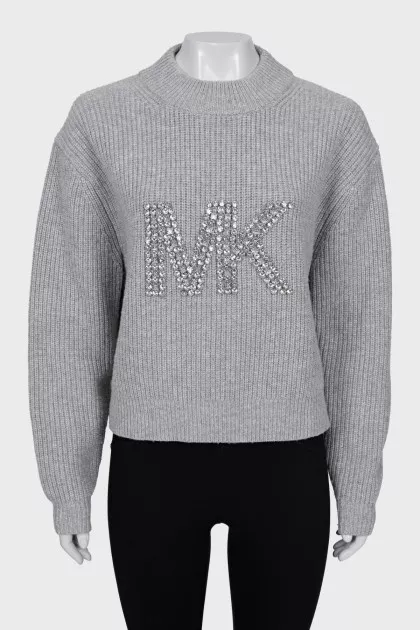 Knitted sweater with decorated logo