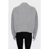 Knitted sweater with decorated logo