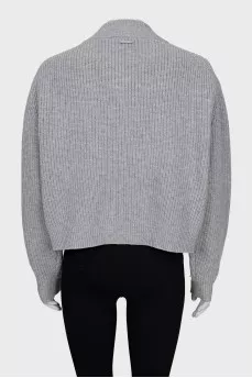 Knitted sweater with decorated logo
