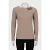 Brown jumper with straps