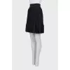 Black pleated mini skirt