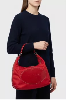 Textile bag with leather logo