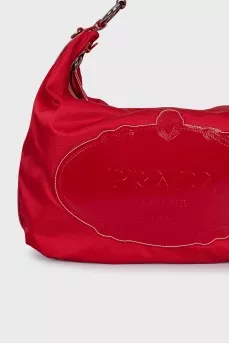 Textile bag with leather logo