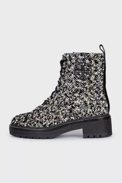 Textile boots with laces and a zipper