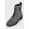 Textile boots with laces and a zipper