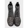 Textile boots with laces and a zipper