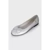 Silver ballet flats with bows