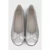 Silver ballet flats with bows