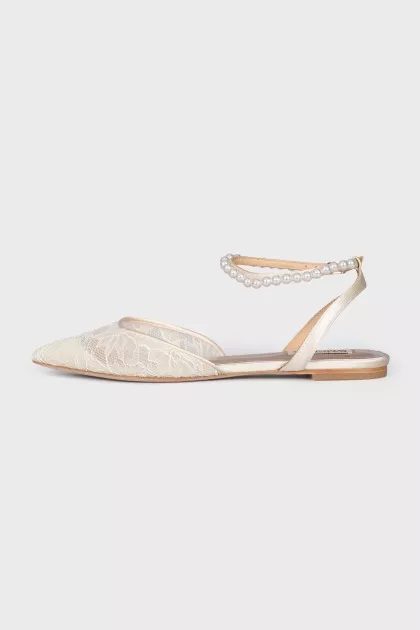 Lace slingbacks decorated with beads