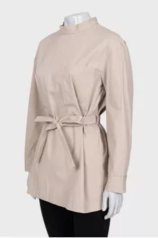 Beige blouse with belt