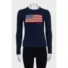 Blue jumper with signature print