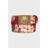 Red belt with floral print