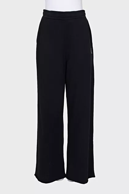 Sports pants with the brand logo