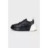 Black and white leather sneakers