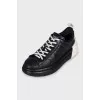 Black and white leather sneakers