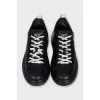 Black and white leather sneakers