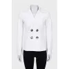 Double-breasted jacket with accent fastening