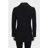 Fitted coat with an accent fastening