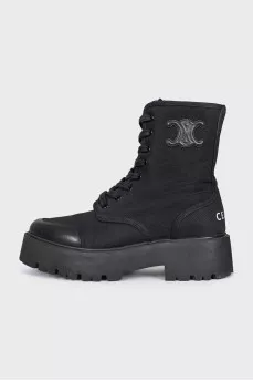 Textile boots with a brand logo