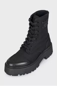 Textile boots with a brand logo