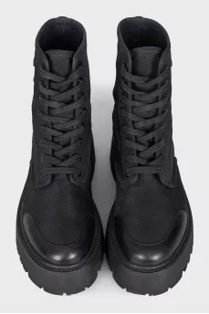 Textile boots with a brand logo