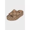 Platform slides with signature monogram