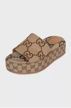 Platform slides with signature monogram