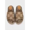 Platform slides with signature monogram