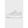 Leather sneakers with a distressed effect