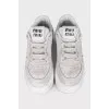 Leather sneakers with a distressed effect