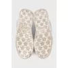 Leather sneakers with a distressed effect