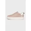 Beige leather sneakers with logo