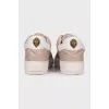 Beige leather sneakers with logo