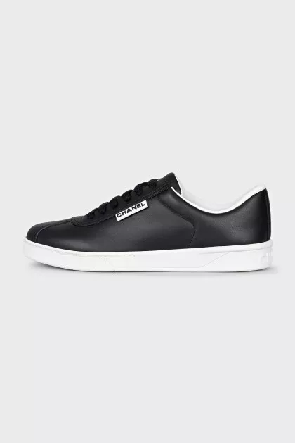 Black leather lace-up sneakers