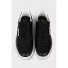 Black leather lace-up sneakers