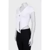 White top with ties and silver logo