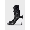 Fishnet sandals with rhinestones